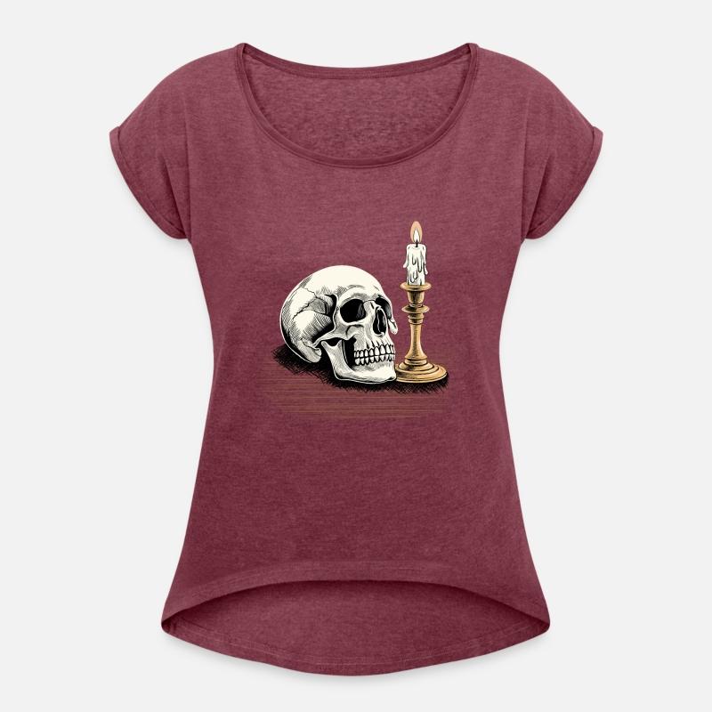 Skull with a burning candle on the table